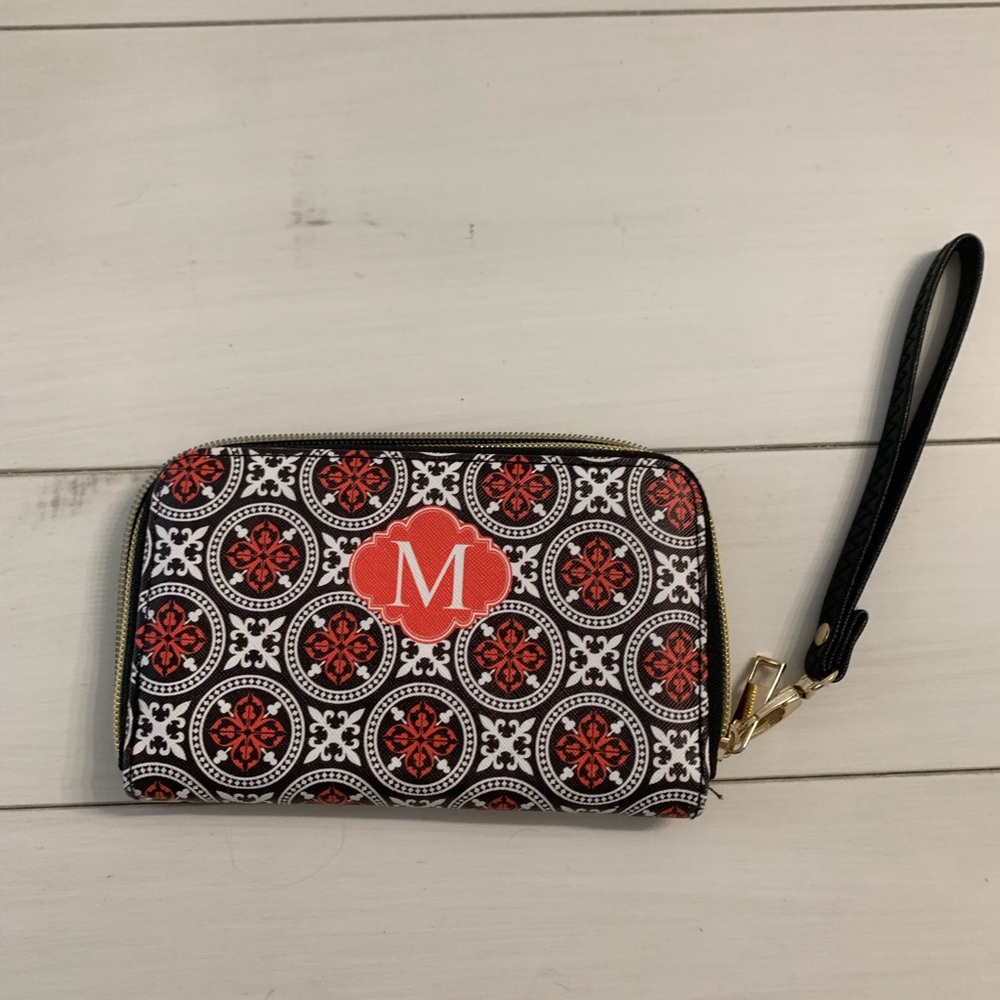 never used “M” wallet. In perfect condition was gifted this